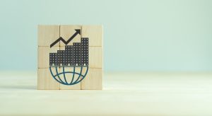 block with city sitting on a network logo and an arrow showing growth