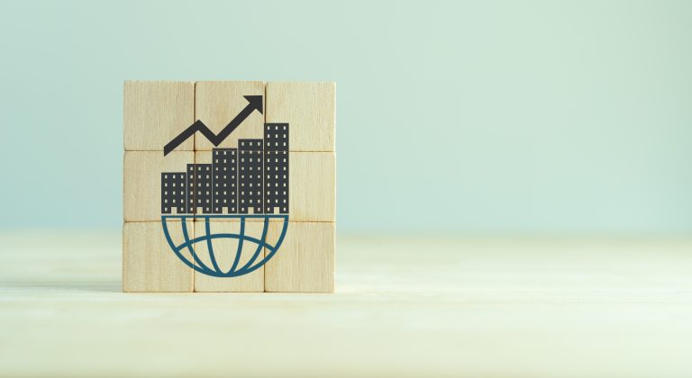 block with city sitting on a network logo and an arrow showing growth