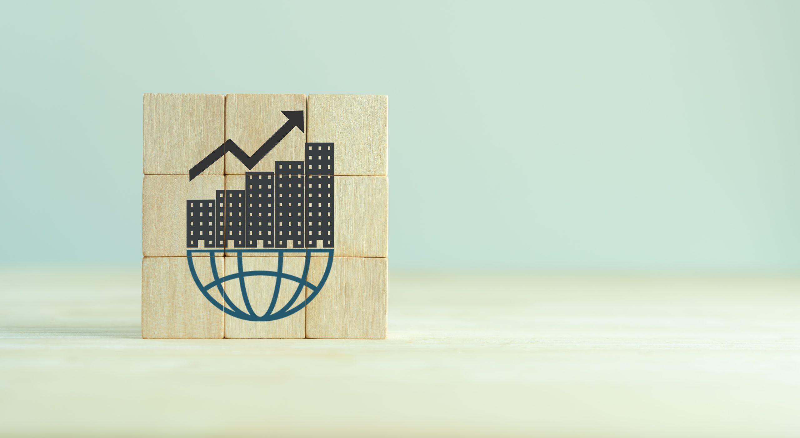 block with city sitting on a network logo and an arrow showing growth