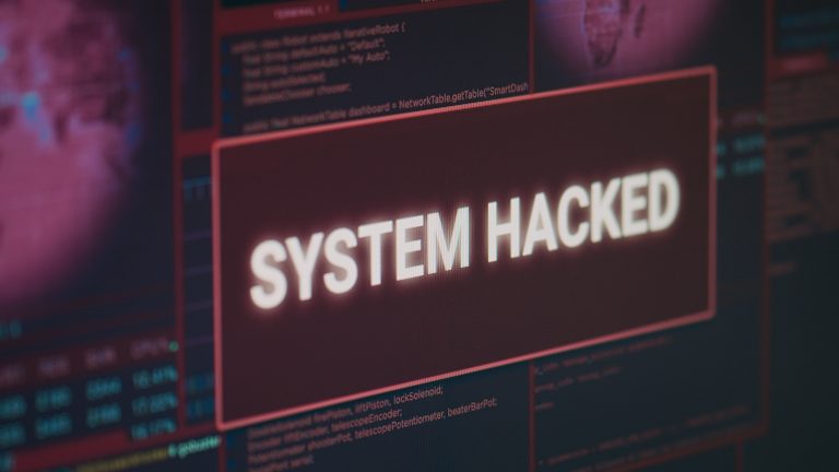 Computer monitor showing hacked system
